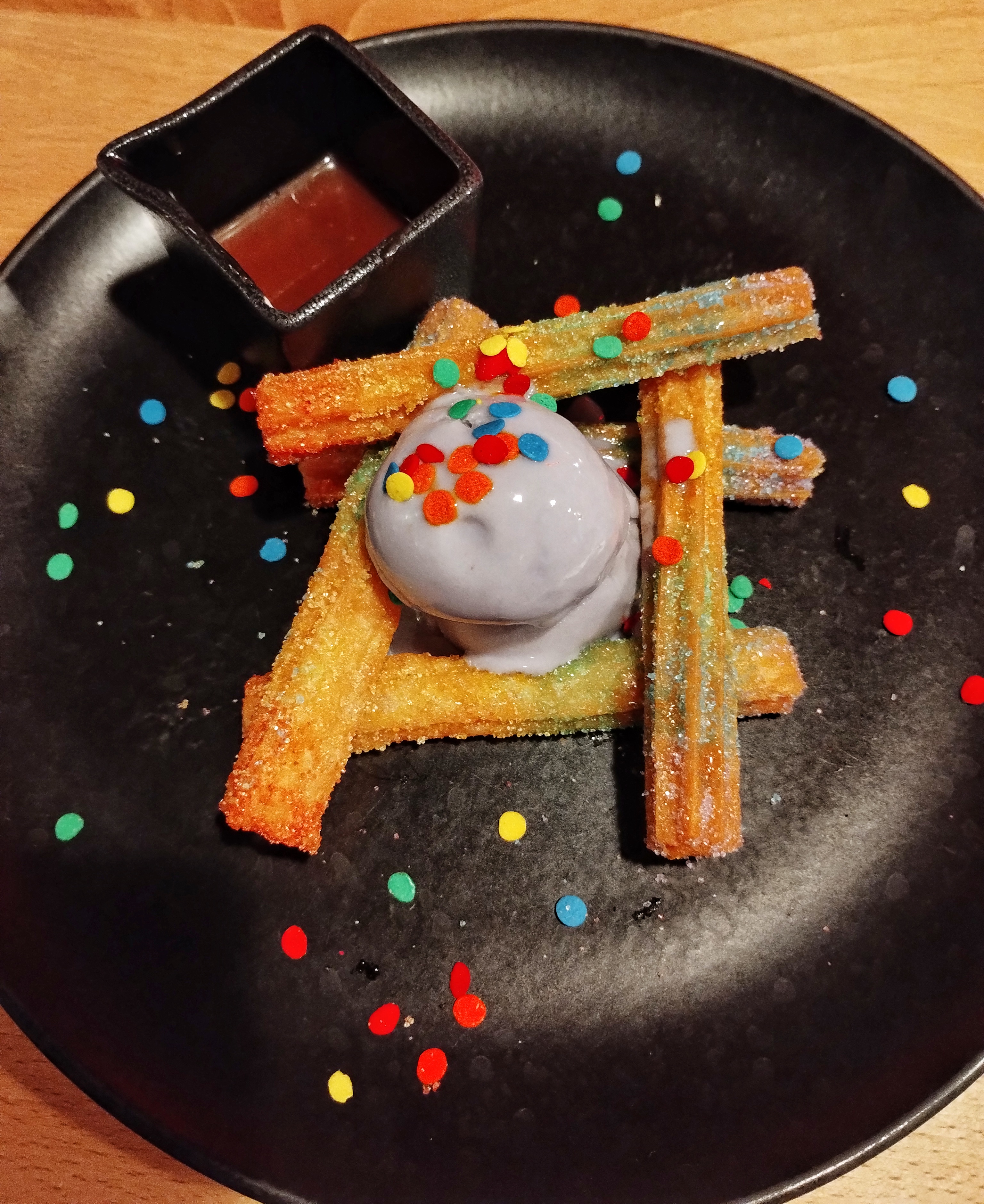 churros and ice cream with coloured sprinkles