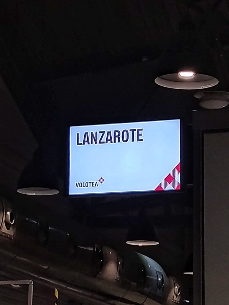an alluminated sign at the airport