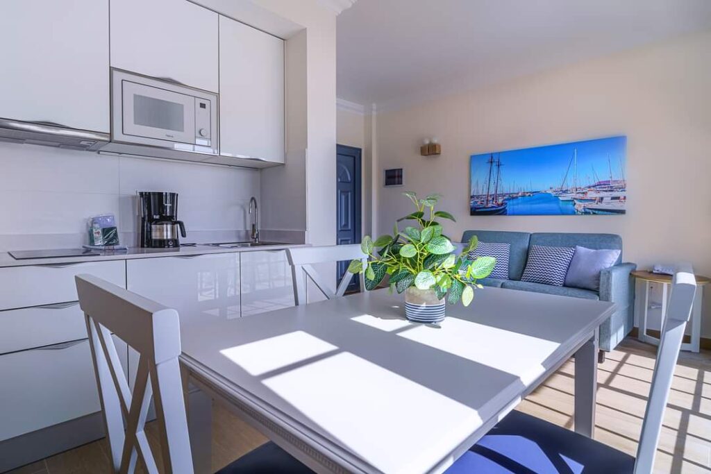 a modern dining area and kitchen