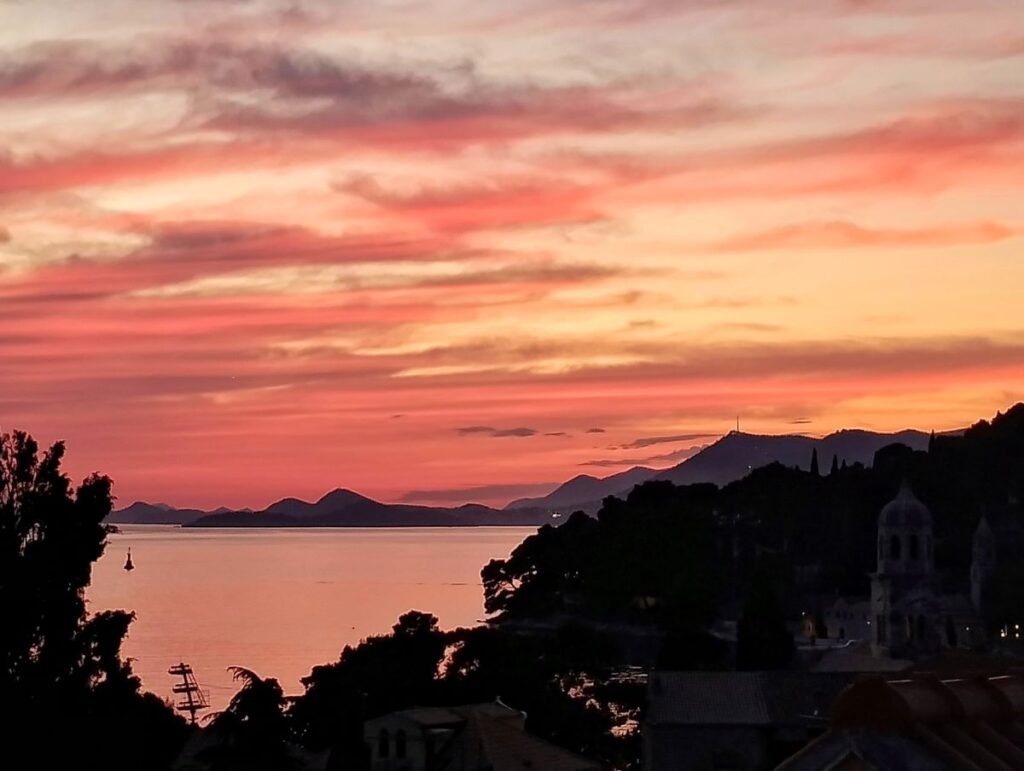 sunset of red and orange overlooking the sea