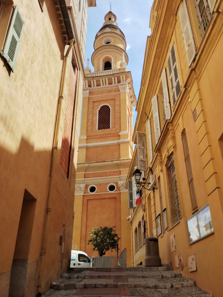 looking uphill to a church steeple