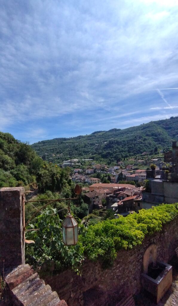 Panoramic view across Dolceacqua’s rooftops to the hillside castle in Liguria